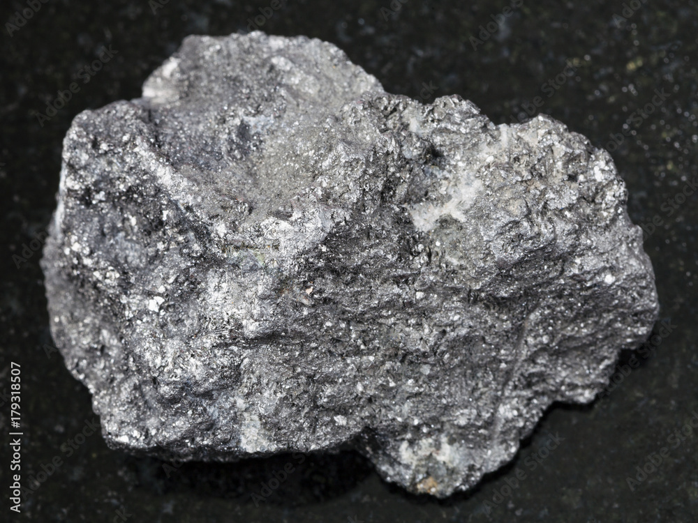 raw Graphite stone on dark background raw Graphite stone on dark background