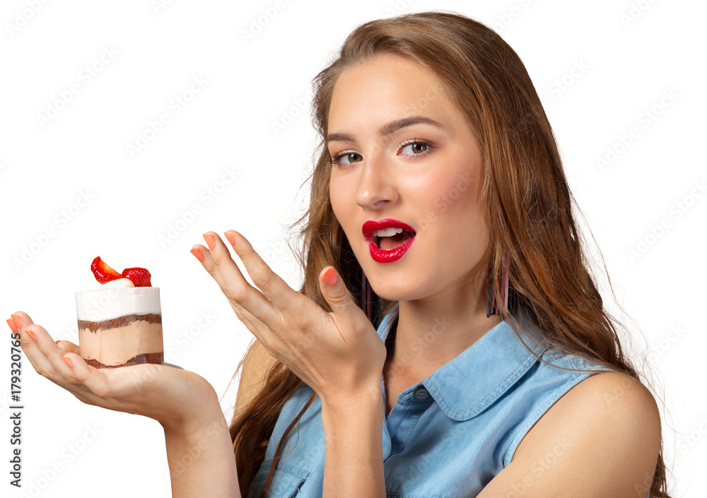 Cute attractive young woman standing and holding cup dessert Cute attractive young woman standing and holding cup dessert
