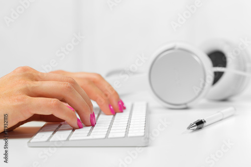 Woman's hands on a keyboard
