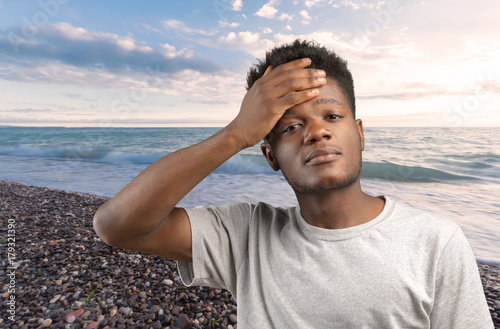 Pensive Afro-American Man Lost in Thoughts