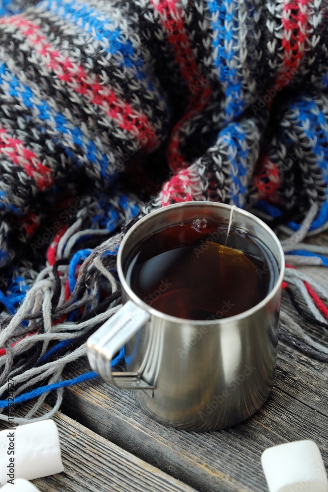 Delicious tea and marshmallow on a wooden table Delicious tea and marshmallow on a wooden table
