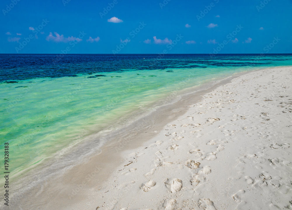 Tropical island vacation image, white sand beach and turquoise blue crystal clear water, Maldives Tropical island vacation image, white sand beach and turquoise blue crystal clear water, Maldives