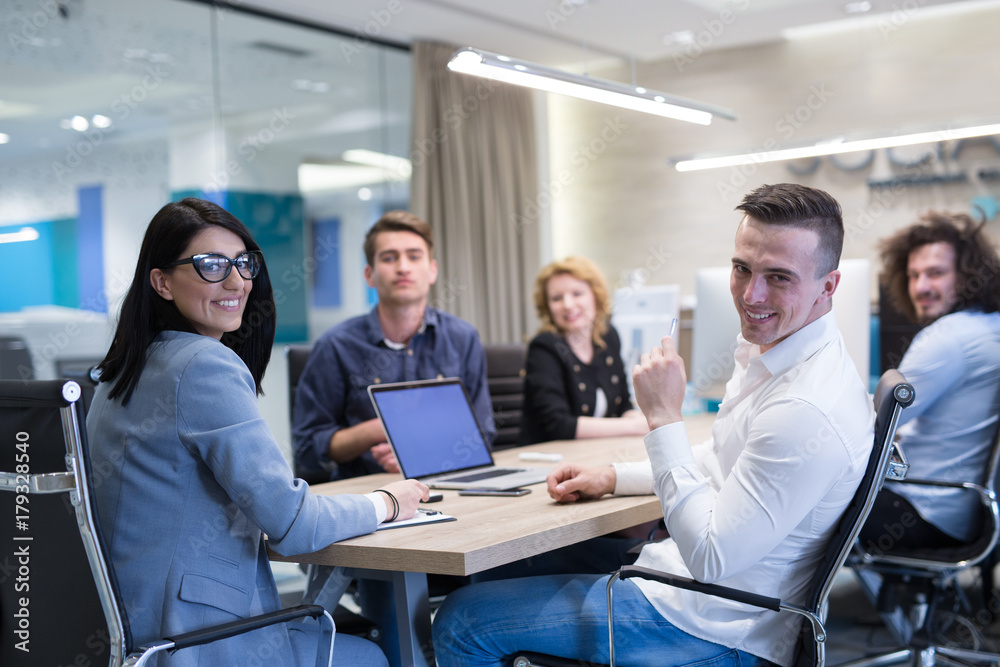 Startup Business Team At A Meeting at modern office building