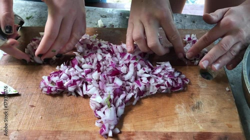 Cooking Breakfast, slicing up onions directly above shot man cutting onion knife chopping board overhead shot fresh cook rapidly some star balls hand molded kitchen camping sun wooden sliced vegetable