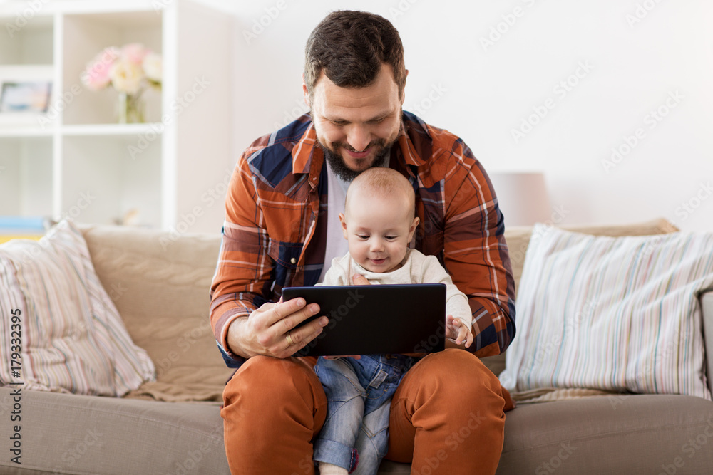 happy father and baby boy with tablet pc at home happy father and baby boy with tablet pc at home