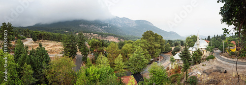 Tahtali mountain with fog, shot from beycik village in Turkey