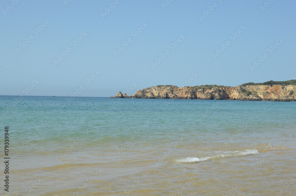 Beautiful cliffs and sea coastline outdoors natural background Portugal Europe. Recreational tourism inspirational scenery photograph