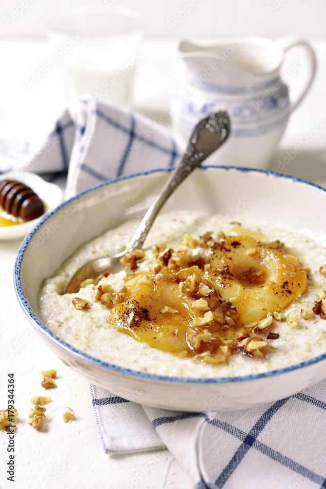 Oat porridge with caramelized pear and nuts.