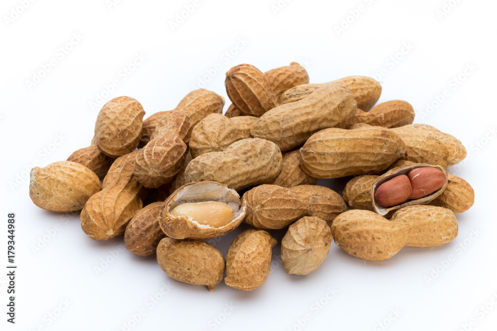 Dried peanuts on the white background. Dried peanuts on the white background.