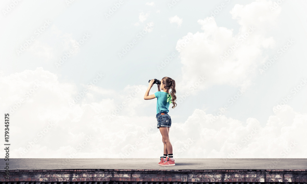 Concept of careless happy childhood with girl of school age look Concept of careless happy childhood with girl of school age look