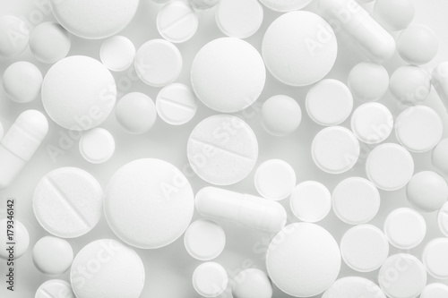 Pharmacy theme, white medicine tablets antibiotic pills. © zadorozhna