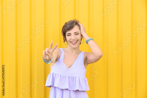 Attractive hipster girl pos...