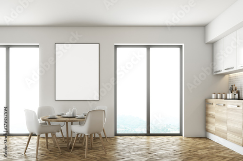 White and wooden dining room and kitchen