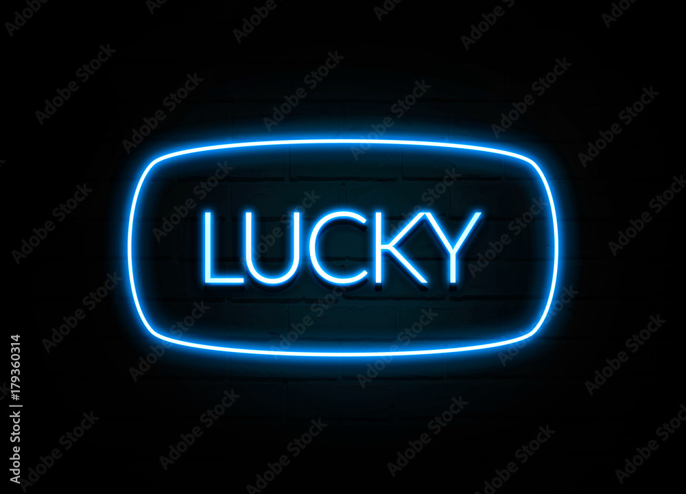 Lucky - colorful Neon Sign on brickwall Lucky - colorful Neon Sign on brickwall