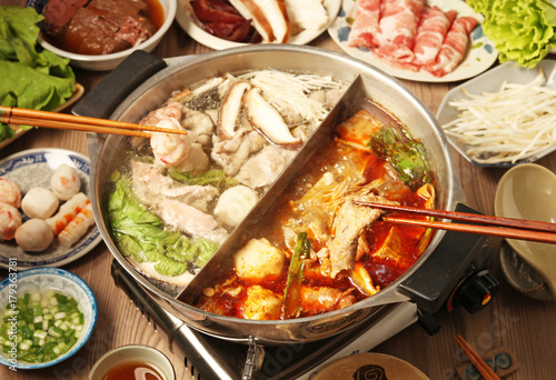  Double flavor hot pot on the table   