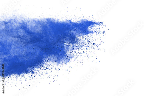 Freeze motion of blue powder explosions isolated on white background