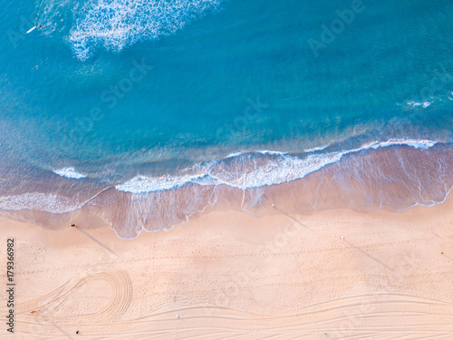 Photography Aerial view of beach shore in the morning.