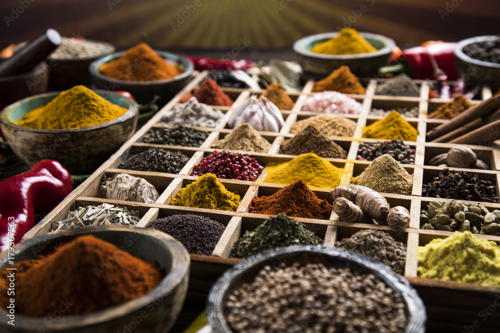 Fototapeta premium Wooden box with spices and herbs