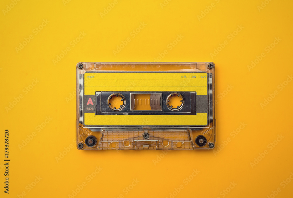 audio cassete on yellow background