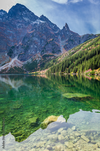 Fototapeta Naklejka Na Ścianę i Meble -  Colorful dusk at pond in the Tatra Mountains in autumn