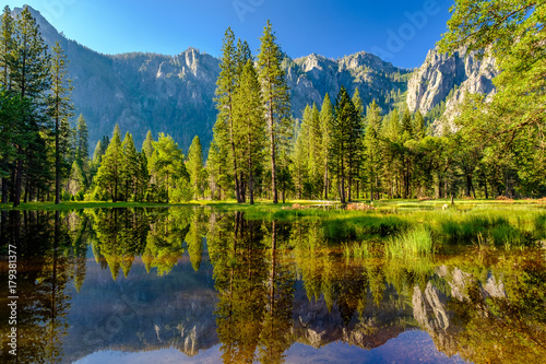 Cathedral Rocks reflecting in Merced River at Yosemite © haveseen