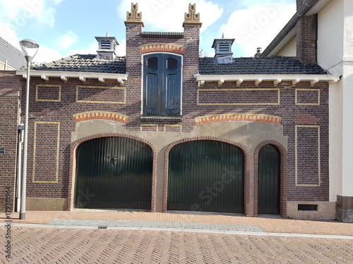 Historic warehouse in village of Zevenhuizen photo