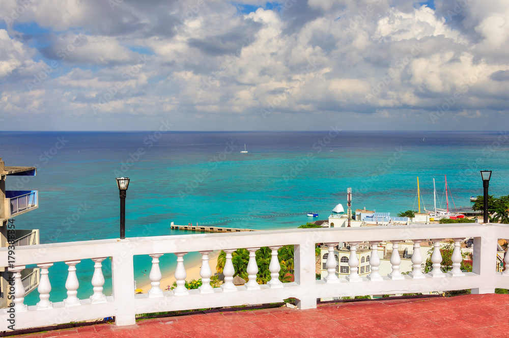 Naklejka premium Beautiful promenade alley over beach in Montego Bay, Jamaica. Caribbean paradise island.