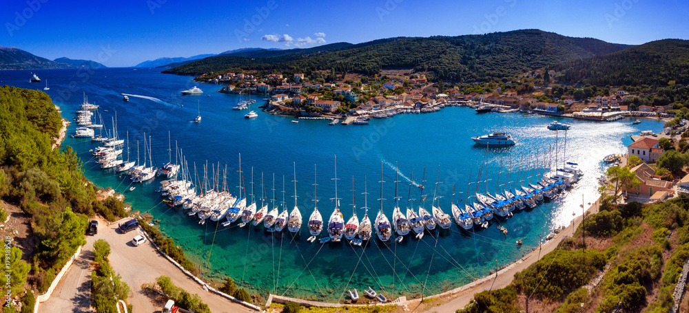 Fototapeta premium Yachts ancored in harbour in Fiskardo Kefalonya bay in Greece