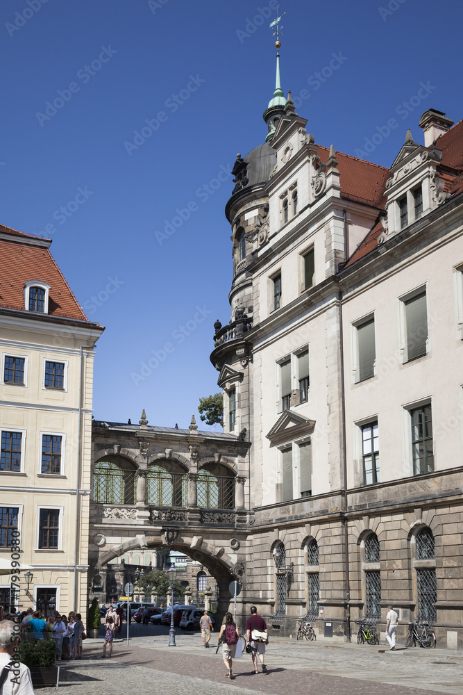 an archway between two buildings in Dresden Germany