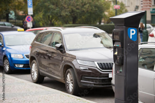 Fotografie Parking machine with solar panel in the city street