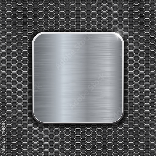 Metal perforated background with brushed iron square plate