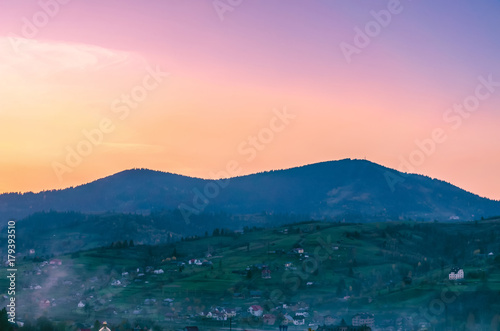 Ukrainian Carpathian Mountains landscape background during the sunset in the autumn season