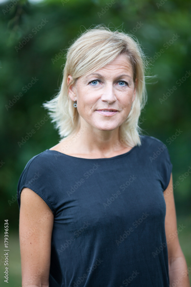 Portrait of a cute blond scandinavian woman shot outdoor Portrait of a cute blond scandinavian woman shot outdoor