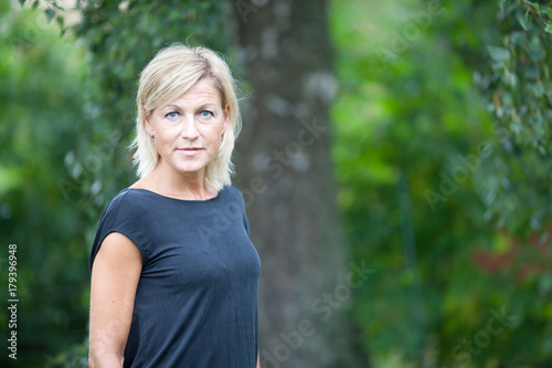 Portrait of a cute blond scandinavian woman shot outdoor