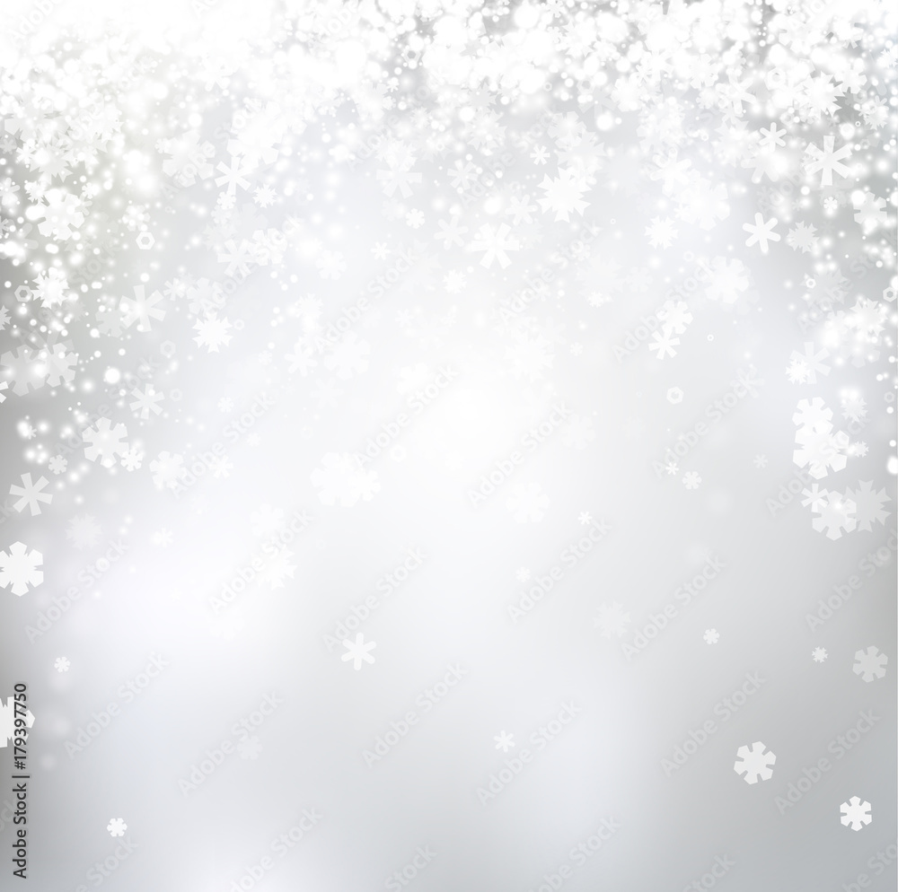 Blurred winter background with snowflakes.