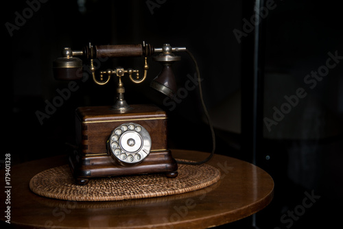 Old fashioned wooden telephone, retro styled 