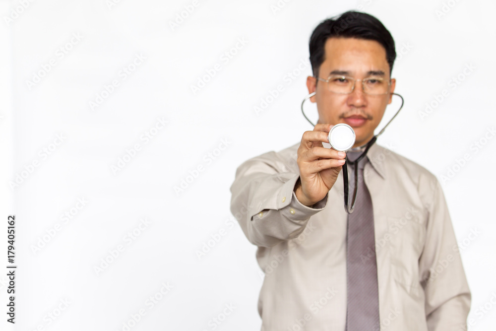 Asian doctor showing a stethoscope in the front close up on solid white background. Asian doctor showing a stethoscope in the front close up on solid white background.