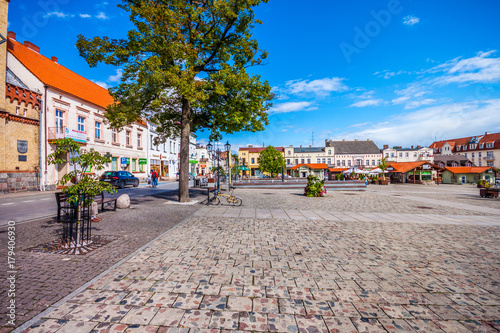 Main city square. Large market square in Swiecie on Vistula with neo-Gothic town hall from 1879.