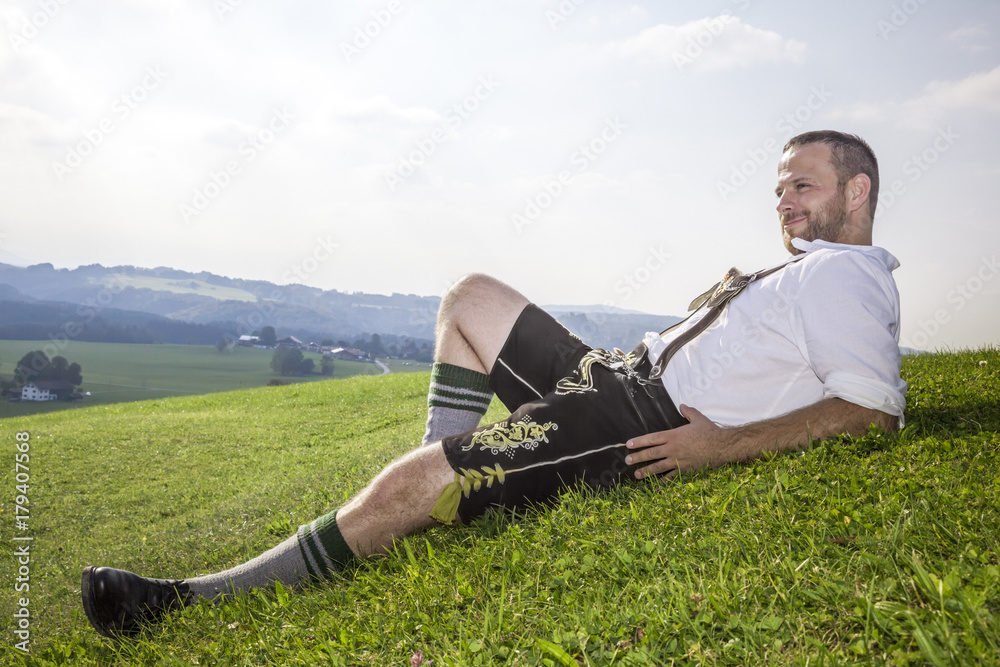 Fototapeta premium bavarian tradition man in the grass