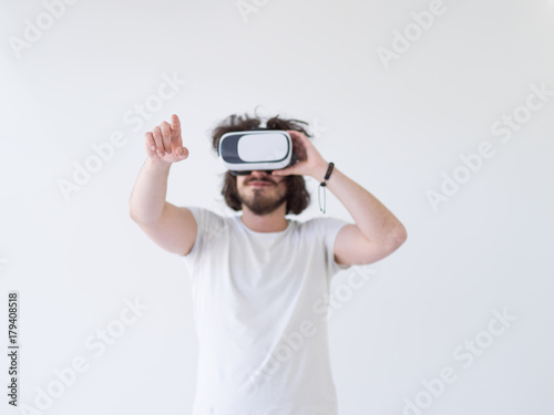 Man using headset of virtual reality © .shock
