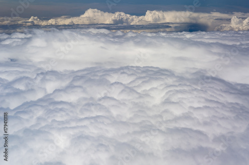 The top view on clouds from an airplane window