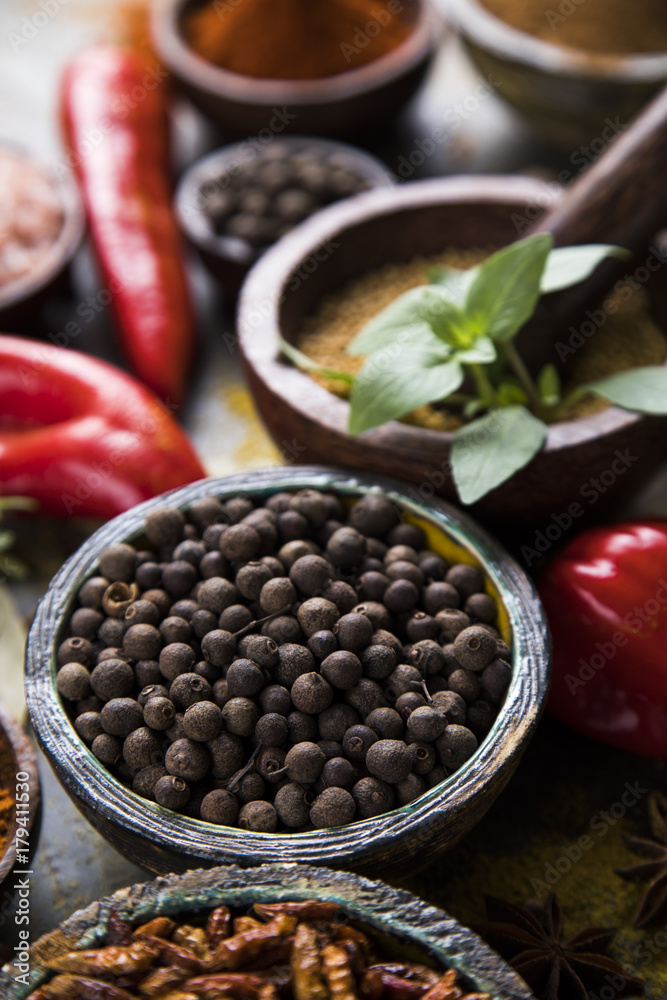 Spices and herbs in wooden bowls. Food and cuisine ingredients Spices and herbs in wooden bowls. Food and cuisine ingredients