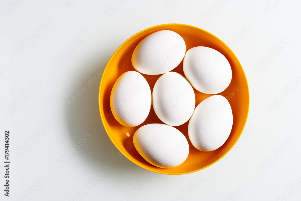 Still life of six white eggs in a bowl Still life of six white eggs in a bowl