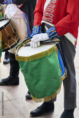 Soldiers drumming in Tamborrada of San Sebastian, the drum parade to commemorate the day that allied Anglo-Portuguese troops invaded the city. Basque Country, Guipuzcoa. Spain. photo