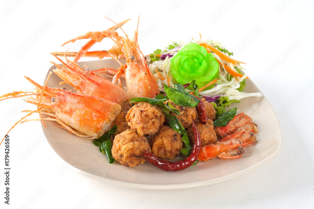fried shrimp ball with head shrimp on white plate on white background fried shrimp ball with head shrimp on white plate on white background