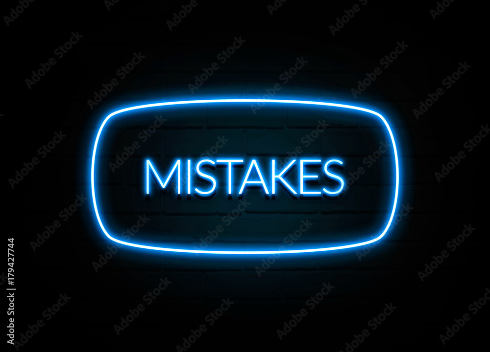 Mistakes  - colorful Neon Sign on brickwall