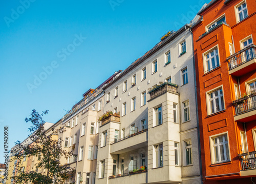 white and red houses in berlin with copy space sky © Robert Herhold