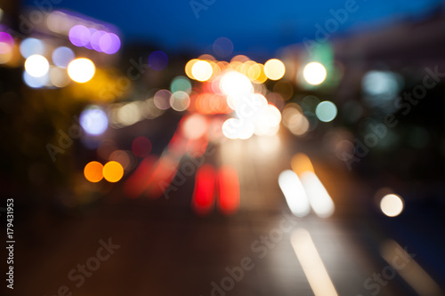blurry background bokeh of traffic with night light © suwanphoto