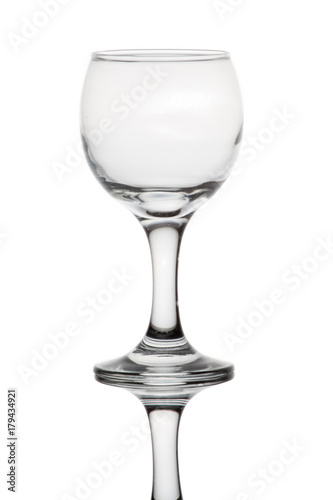 empty wine glass with reflection, isolated on white