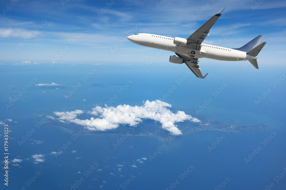 Obraz premium Airplane flying away in to sky high altitude above the white clouds, Airplane taking off, Travel by air transport